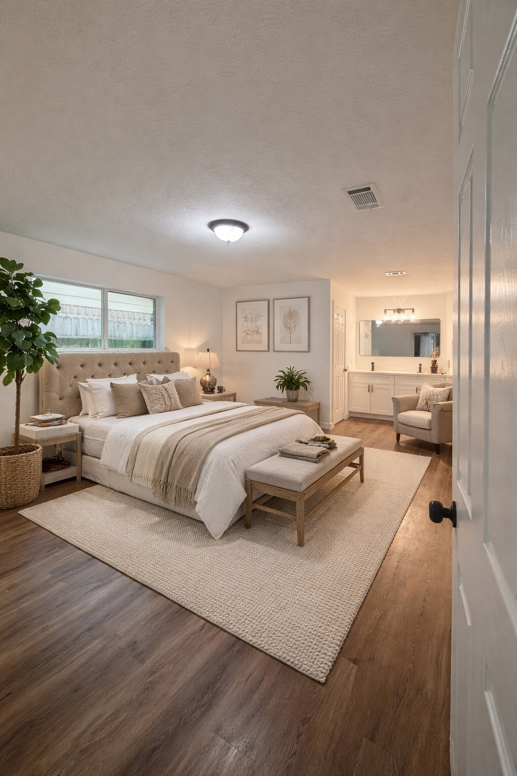 9806 Early Spring Drive Houston, TX 77064 - Photo 9 of 14 a bedroom with a large bed and a couch