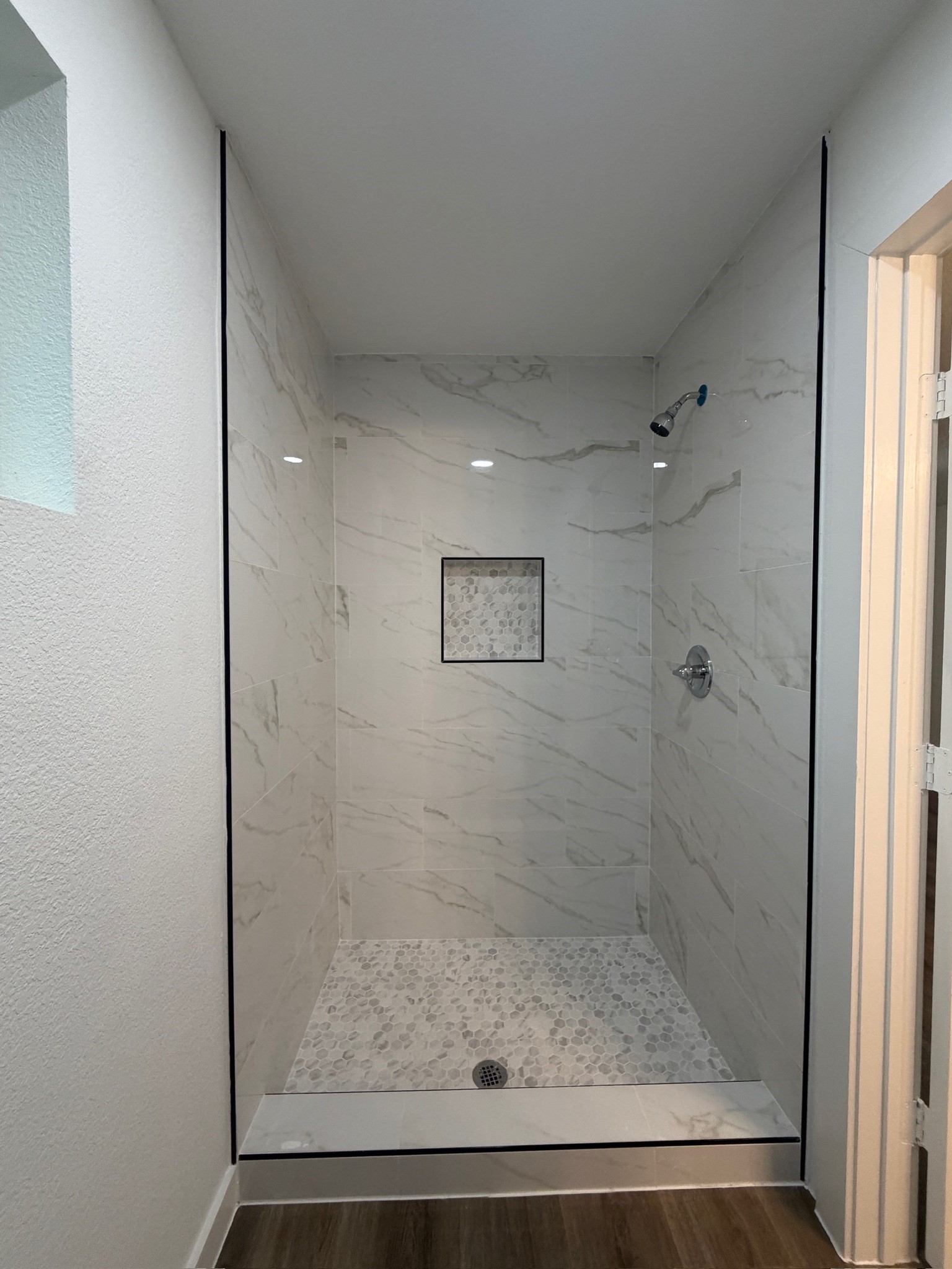 9806 Early Spring Drive Houston, TX 77064 - Photo 10 of 14 a bathroom with a shower