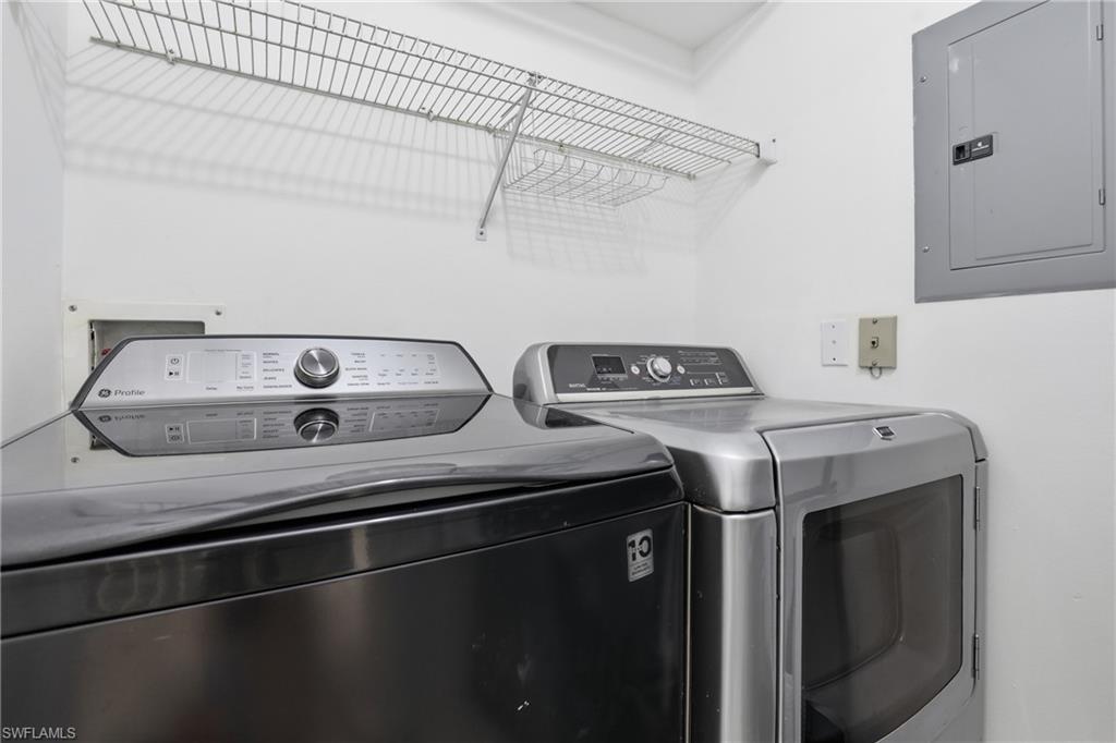 7762 Jewel Lane, Unit 201 Naples, FL 34109 - Photo 28 of 39 a utility room with dryer and washer