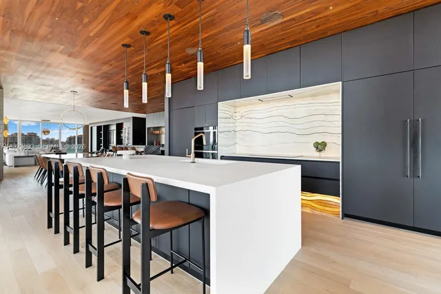 a dinning table and chairs in the patio