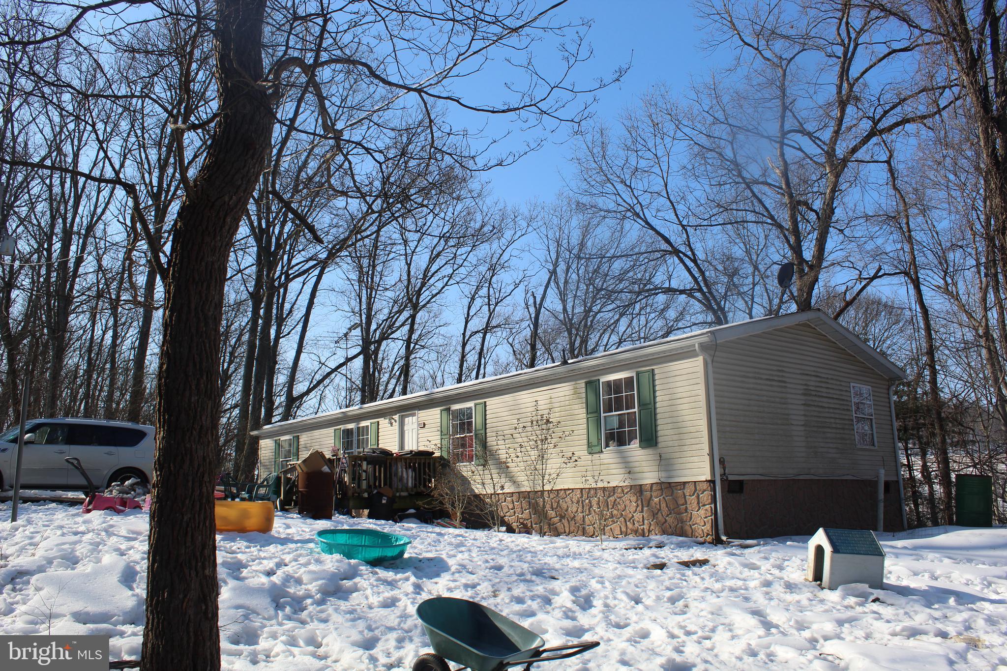 12829 Lanes Run Road Big Pool, MD 21711 - Photo 2 of 3 a front view of a house with a yard