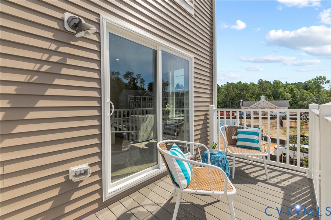 3611 Edna Path, Unit A Richmond, VA 23233 - Photo 29 of 32 a view of a chairs and table on the balcony