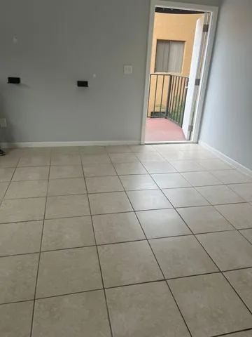 a view of a bathroom with an empty and bathroom