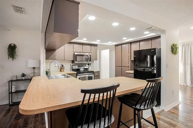 a view of a dining room with furniture