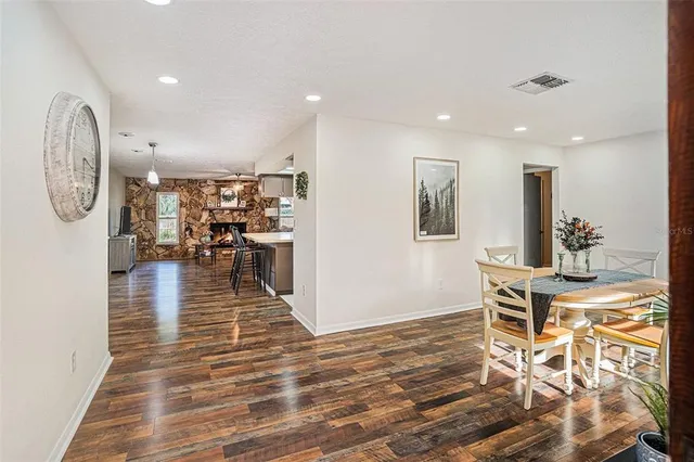 a view of a living room and dining room
