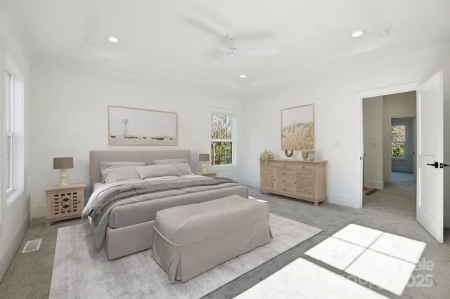 an empty room with windows and entrance