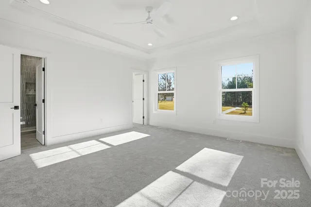 a view of closet area with empty racks
