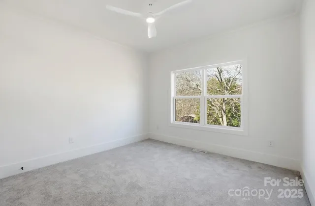 a view of a hallway with window