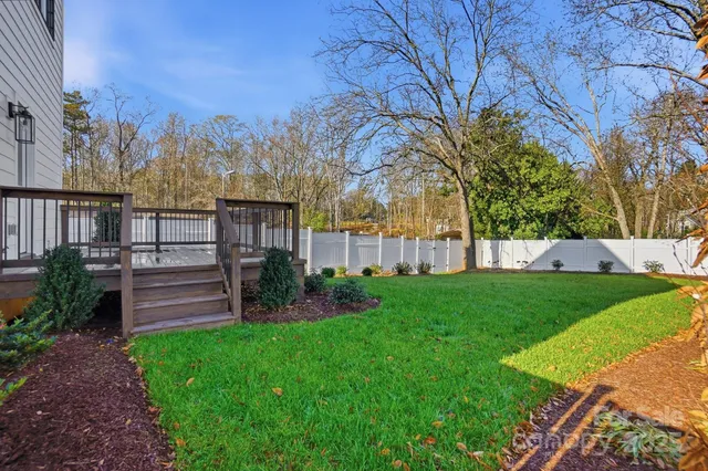 a view of a swimming pool with seating area