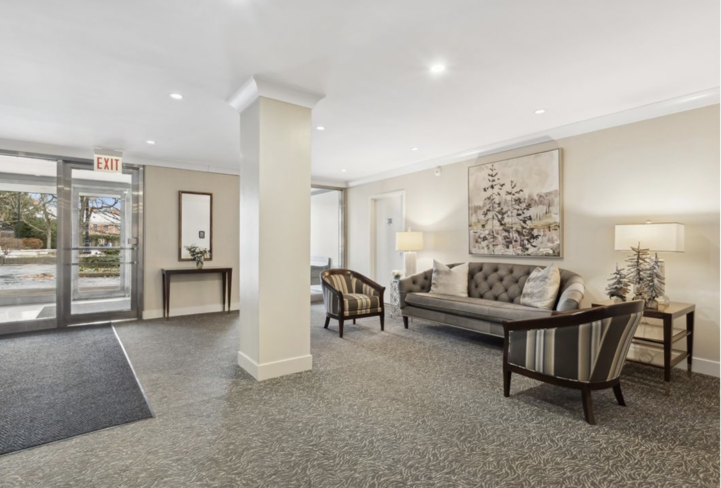 1440 Sheridan Road, Unit 501 Wilmette, IL 60091 - Photo 13 of 20 a living room with furniture and a floor to ceiling window