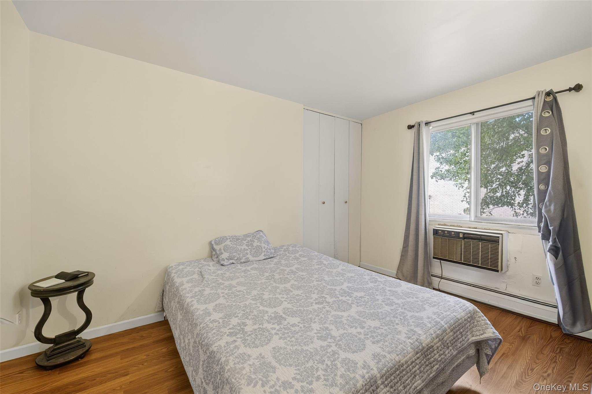 4 Secora, Unit E2 Monsey, NY 10952 - Photo 14 of 24 a bedroom with a bed and a window