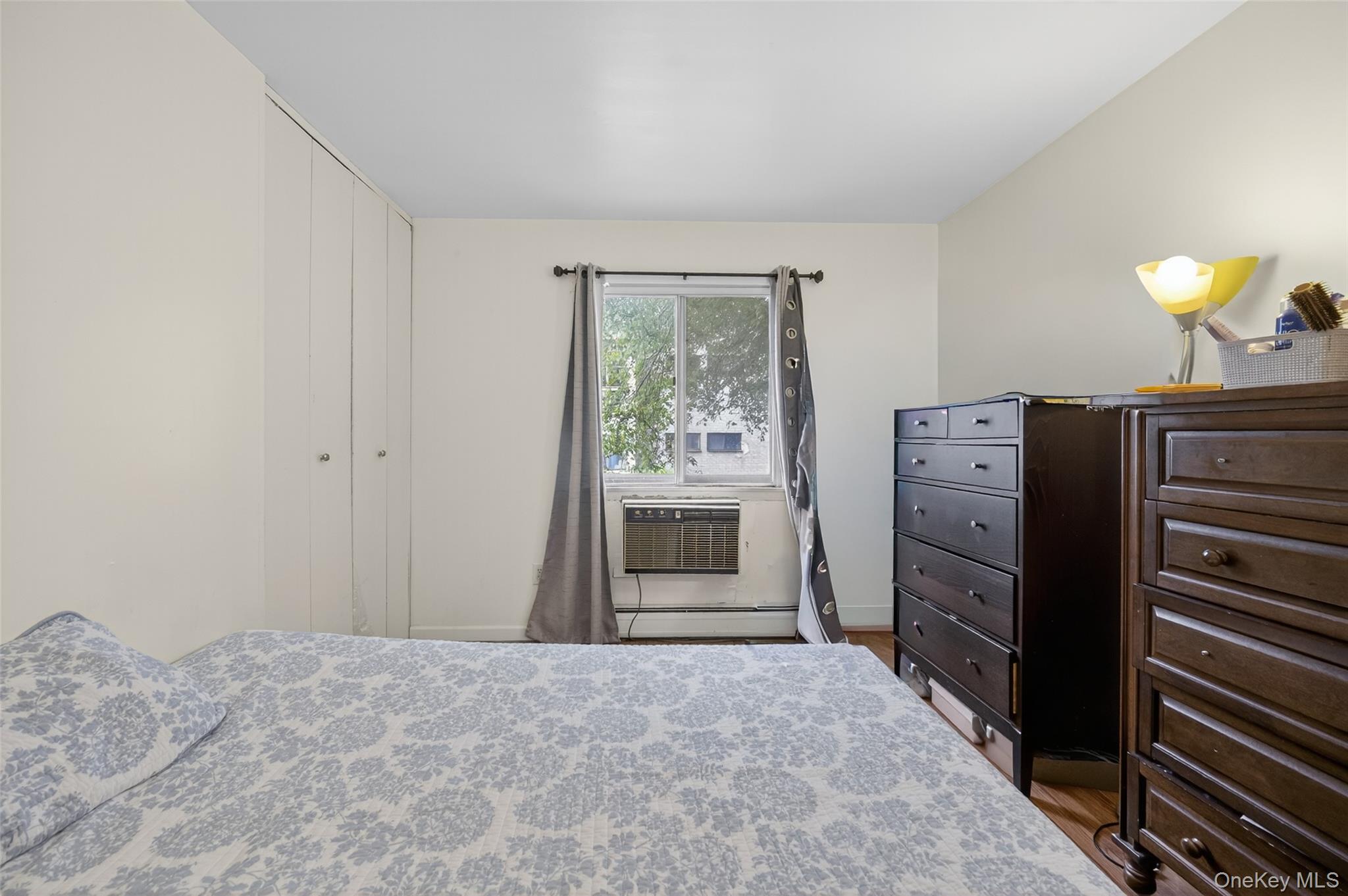 4 Secora, Unit E2 Monsey, NY 10952 - Photo 15 of 24 a bedroom with a bed and a window