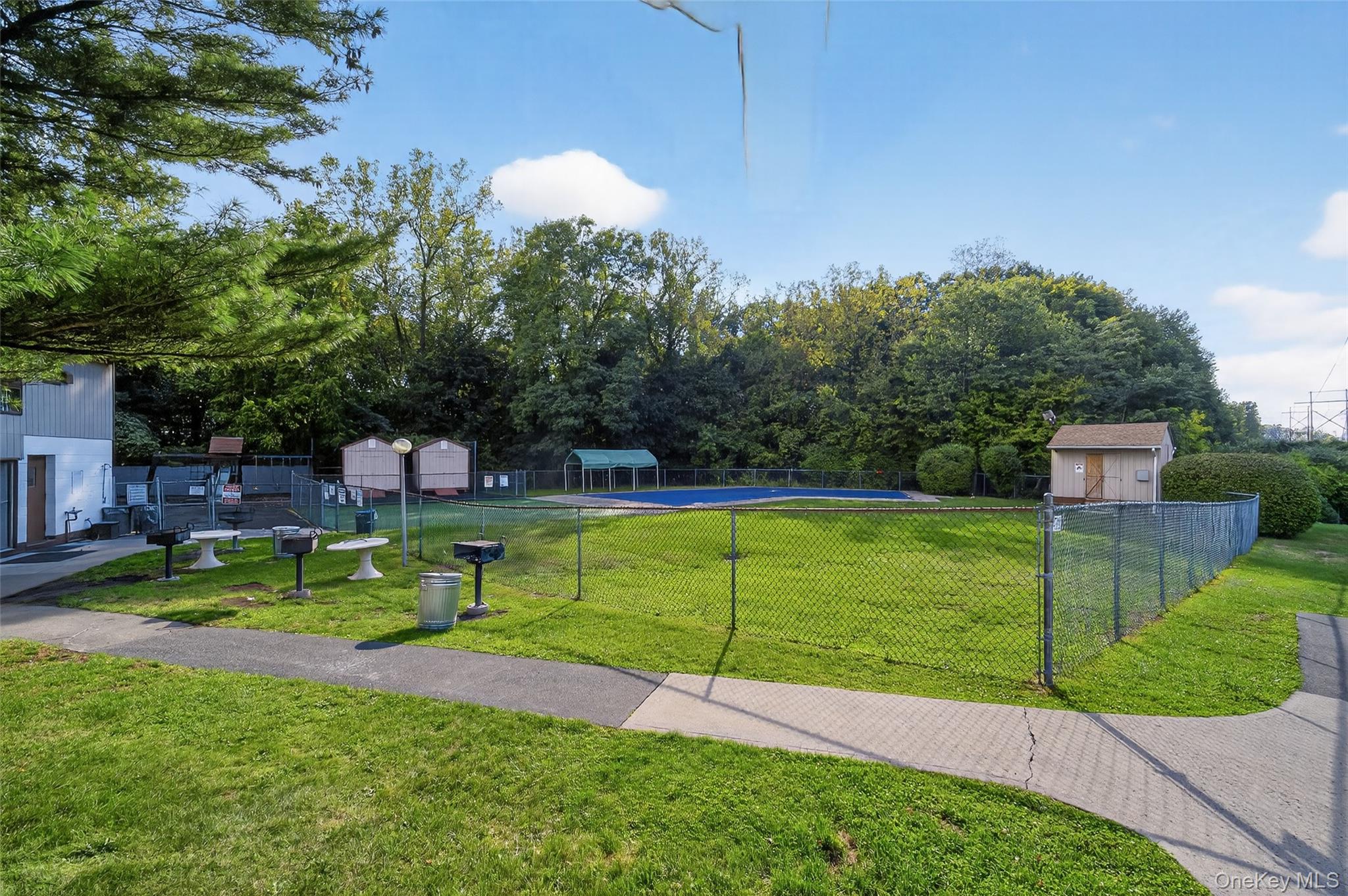 4 Secora, Unit E2 Monsey, NY 10952 - Photo 19 of 24 a view of a park with large trees