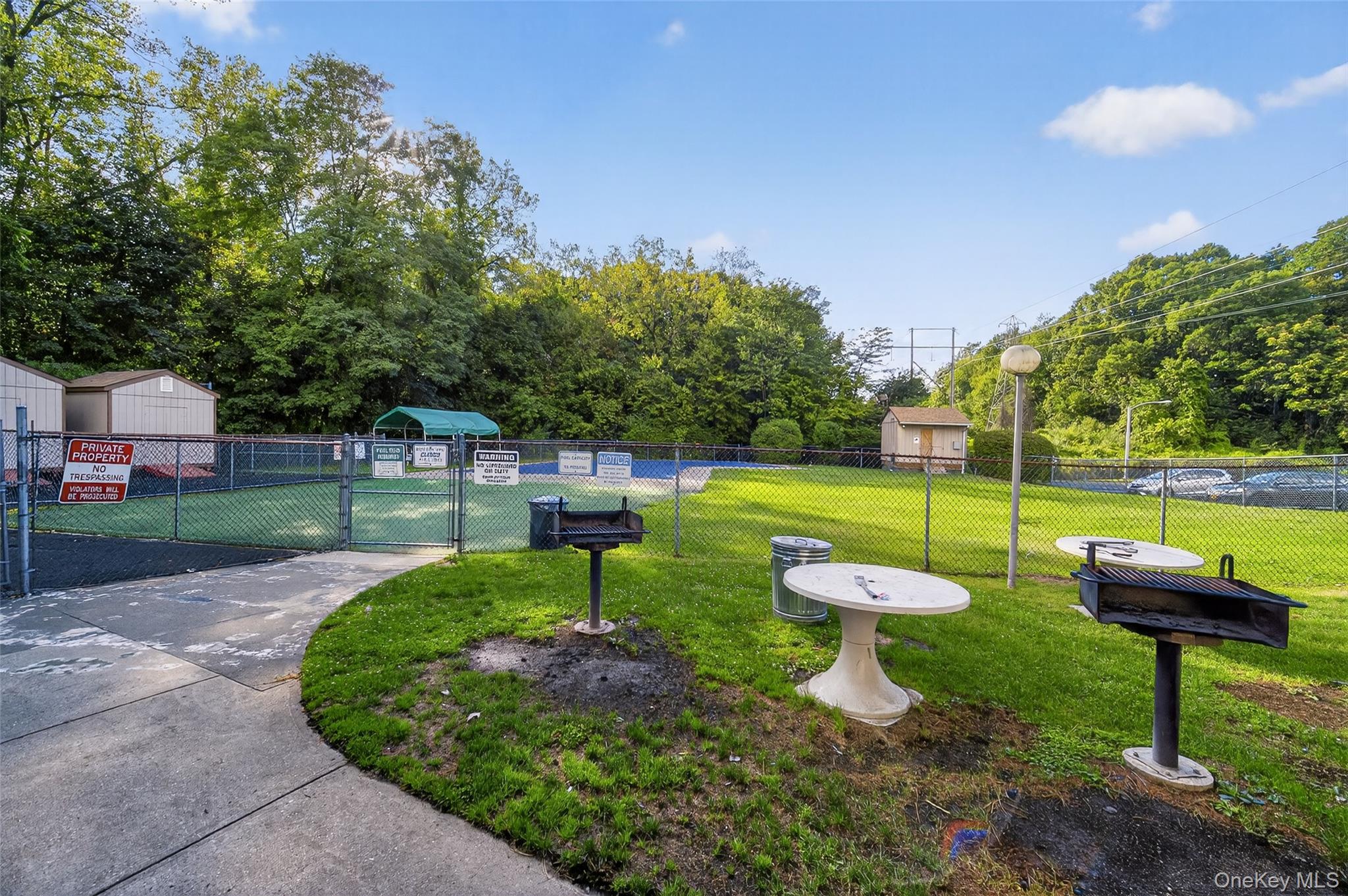 4 Secora, Unit E2 Monsey, NY 10952 - Photo 20 of 24 a view of a park with large trees