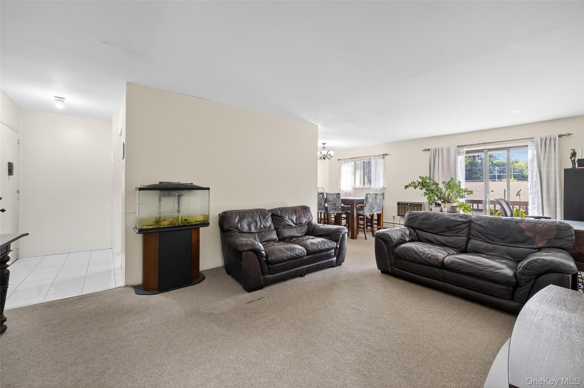 4 Secora, Unit E2 Monsey, NY 10952 - Photo 7 of 24 a living room with furniture and a couch