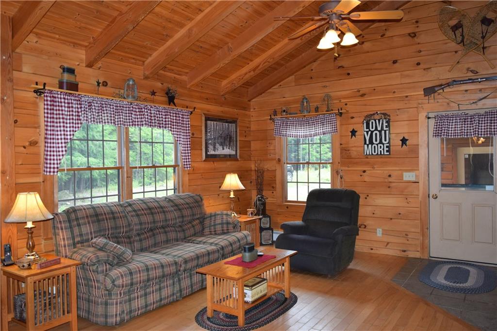 643 Dead River Road Bowdoin, ME 04287 - Photo 14 of 32 Living room with side door to garage.