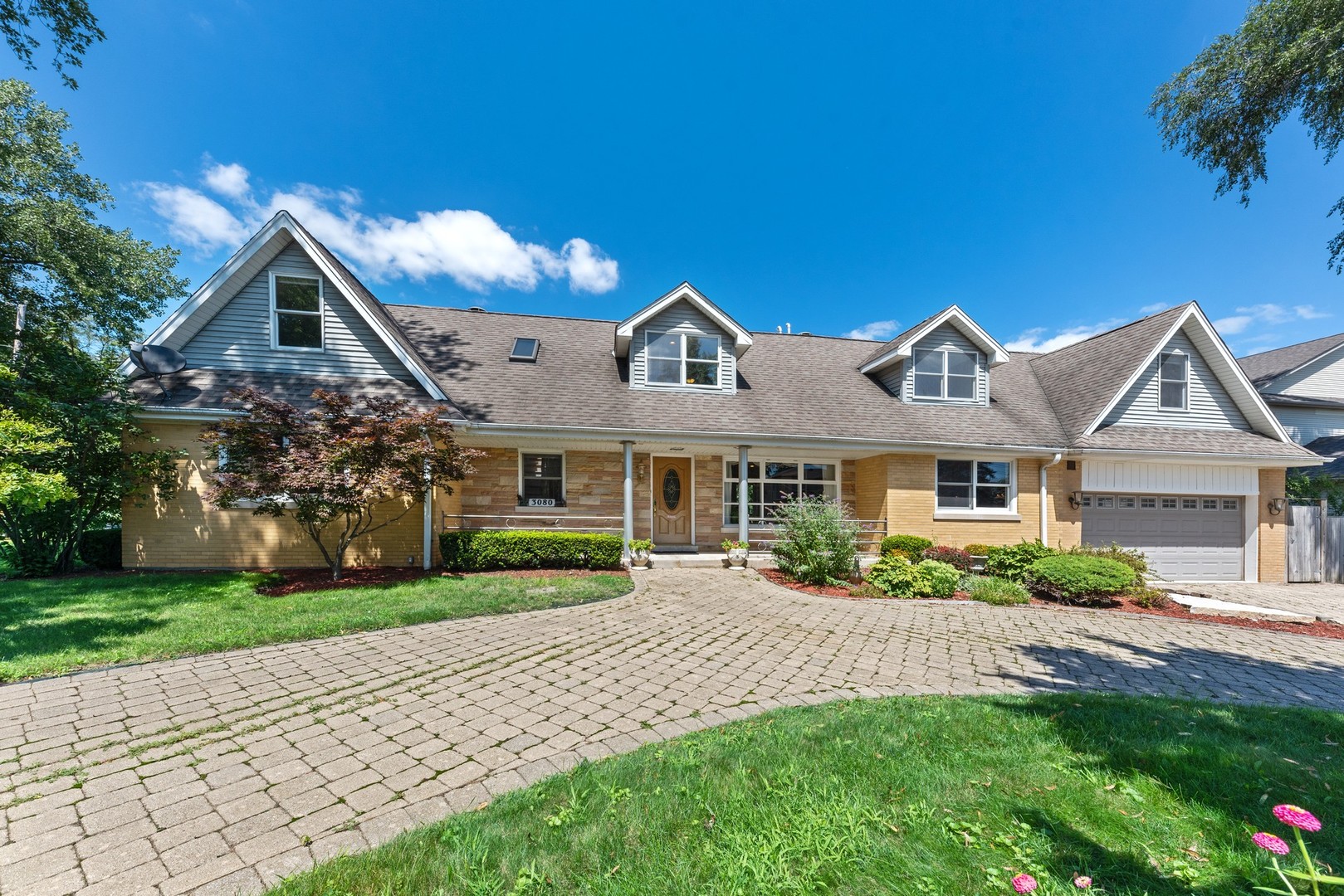 3080 Koepke Road Northbrook, IL 60062 - Photo 1 of 66 a front view of a house with a yard