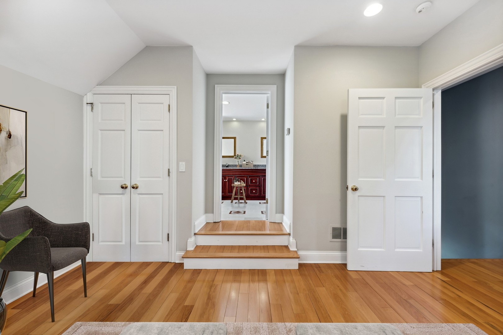 3080 Koepke Road Northbrook, IL 60062 - Photo 18 of 66 a view of a bedroom with wooden floor and a bathroom