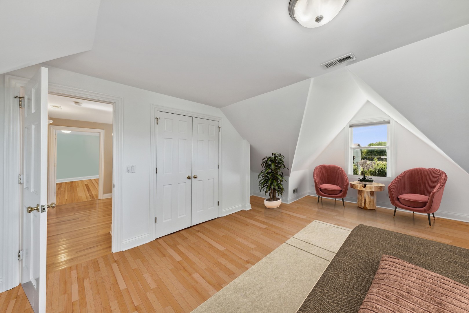 3080 Koepke Road Northbrook, IL 60062 - Photo 23 of 66 a spacious bedroom with a bed and chair