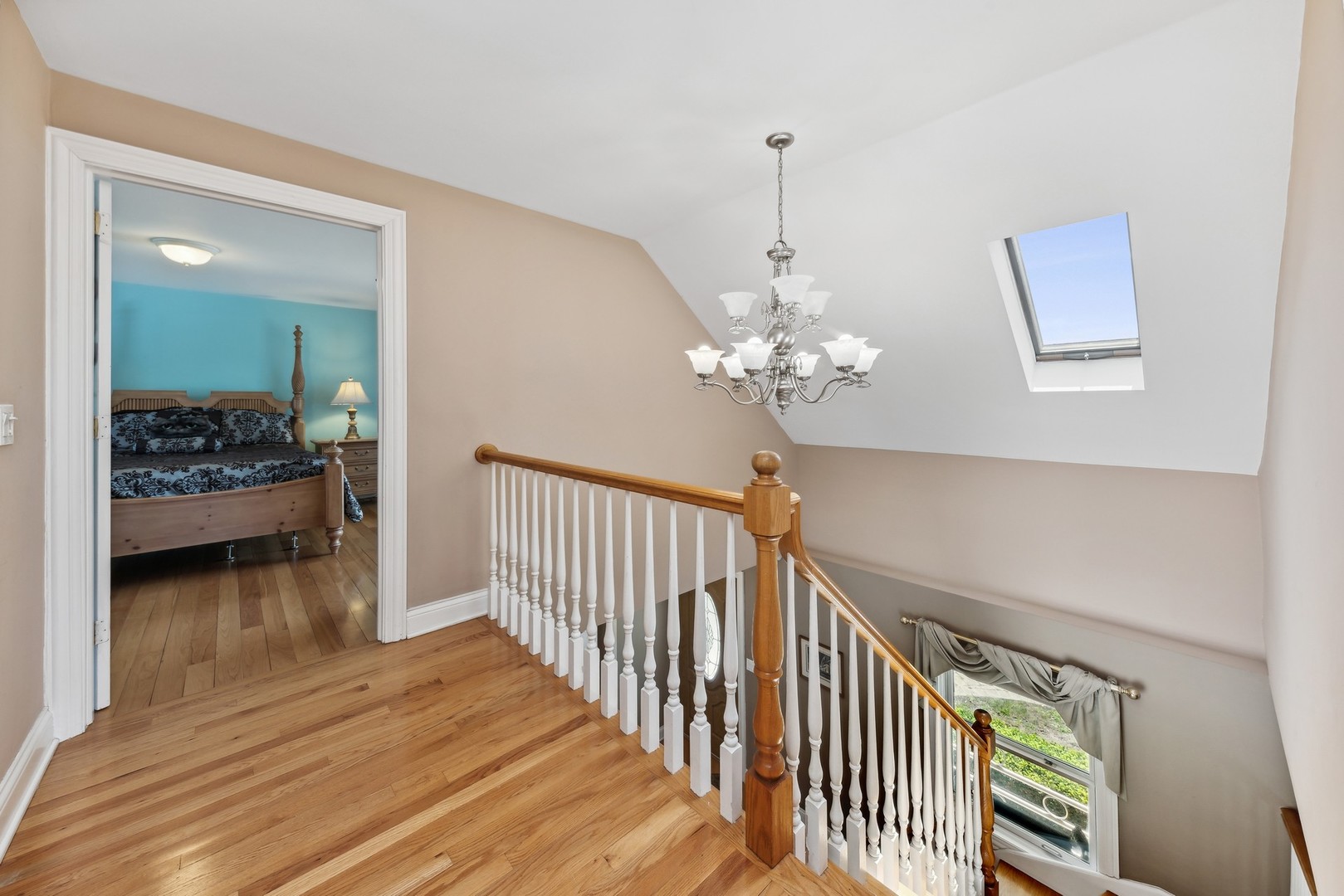3080 Koepke Road Northbrook, IL 60062 - Photo 24 of 66 a view of a hallway to a livingroom and a chandelier