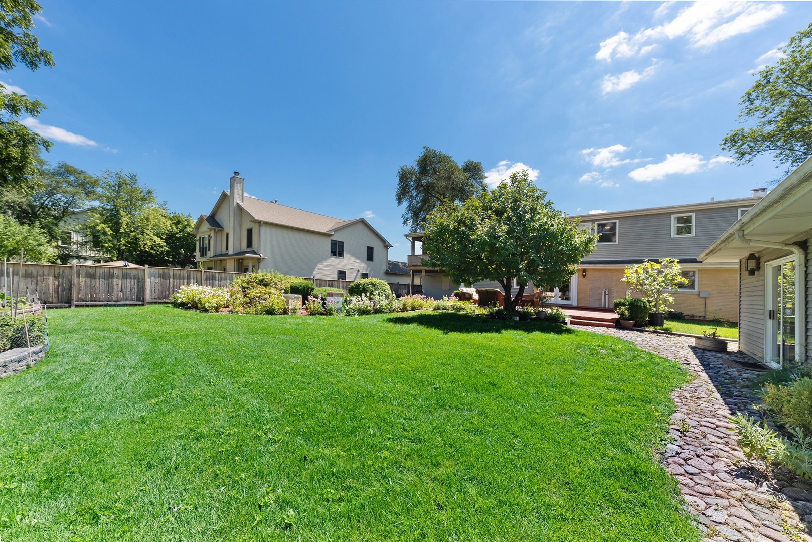 3080 Koepke Road Northbrook, IL 60062 - Photo 39 of 66 a front view of a house with garden
