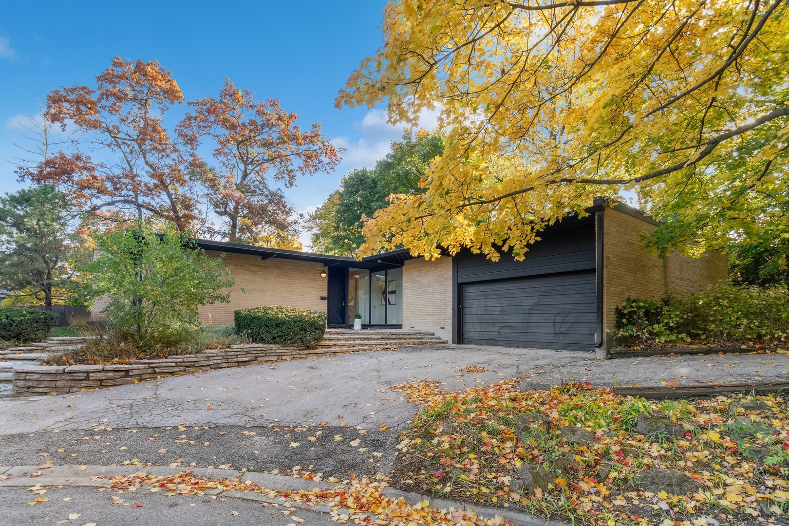 264 Cedar Lane Glencoe, IL 60022 - Photo 1 of 28 a front view of a house with a yard