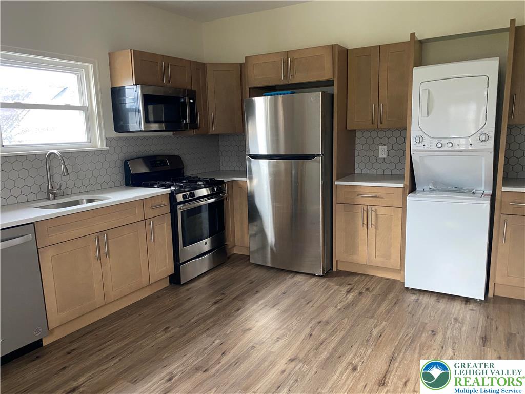 1660 Main Street Hellertown, PA 18055 - Photo 12 of 30 a kitchen with a refrigerator sink and microwave