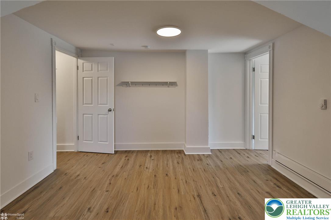 1660 Main Street Hellertown, PA 18055 - Photo 24 of 30 a view of an empty room and wooden floor