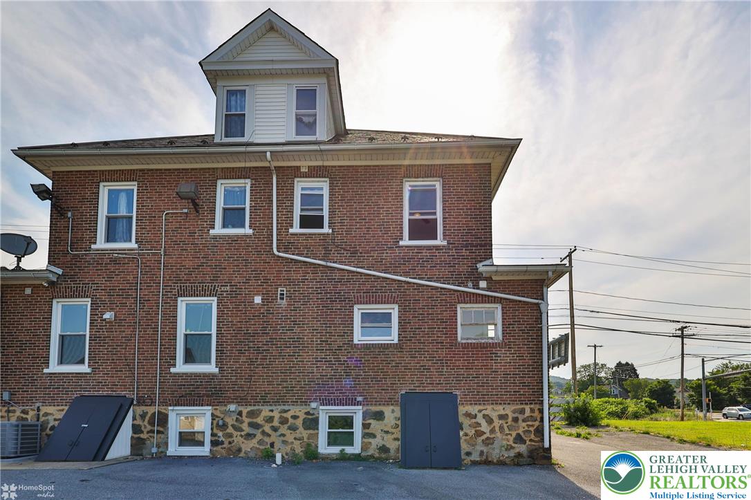 1660 Main Street Hellertown, PA 18055 - Photo 27 of 30 a front view of a house with glass windows