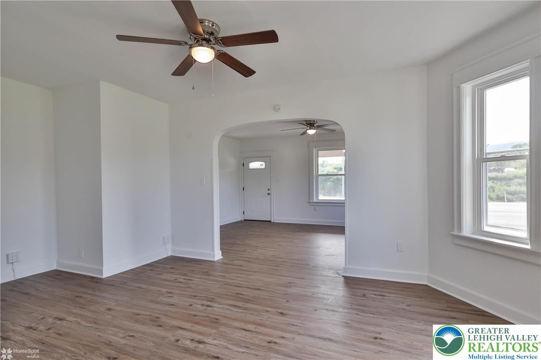 1660 Main Street Hellertown, PA 18055 - Photo 10 of 30 wooden floor in an empty room with a window