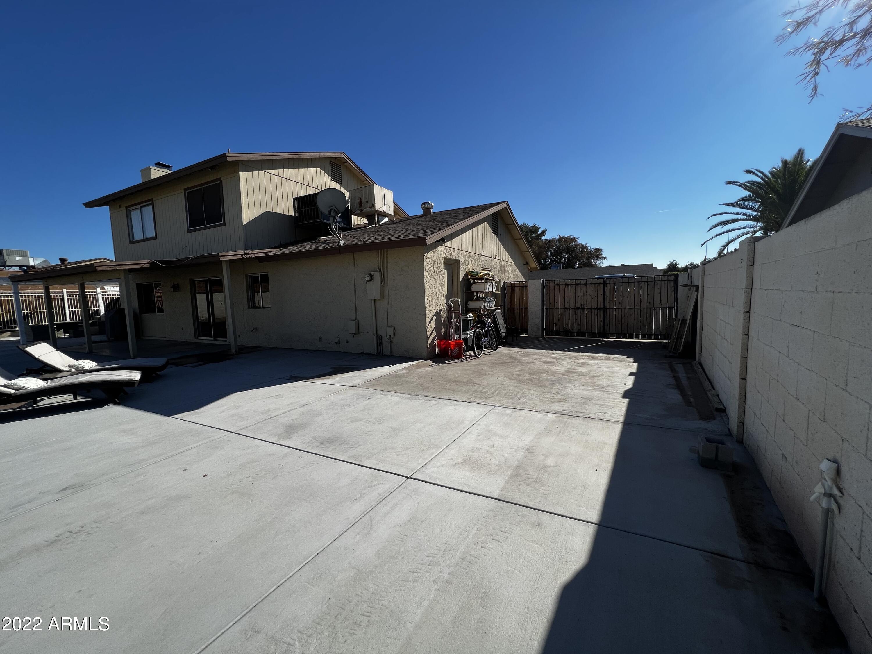 4634 West Calavar Road Glendale, AZ 85306 - Photo 24 of 26 RV Gate with Parking Slab