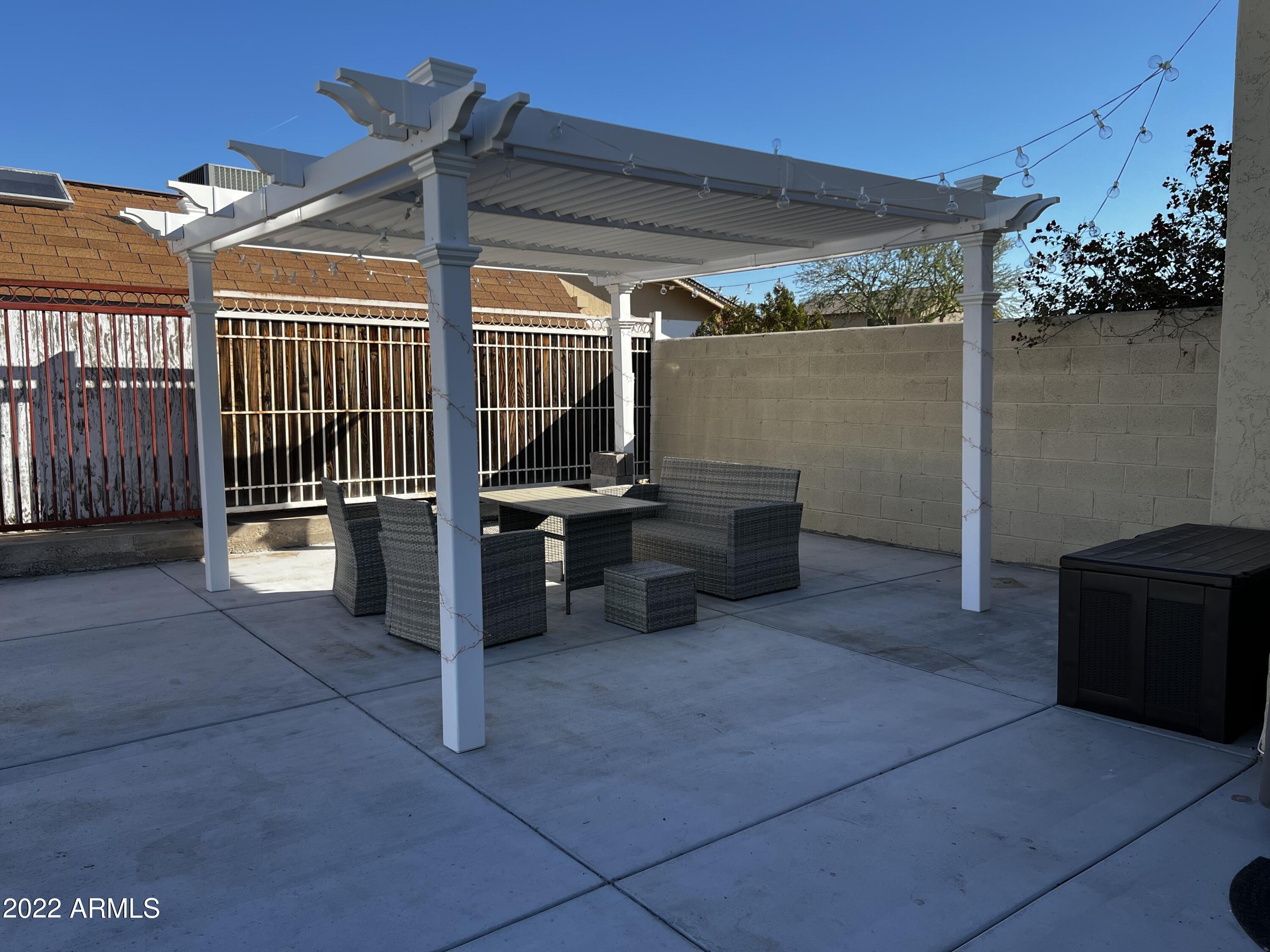 4634 West Calavar Road Glendale, AZ 85306 - Photo 5 of 26 Pergola Sitting Area