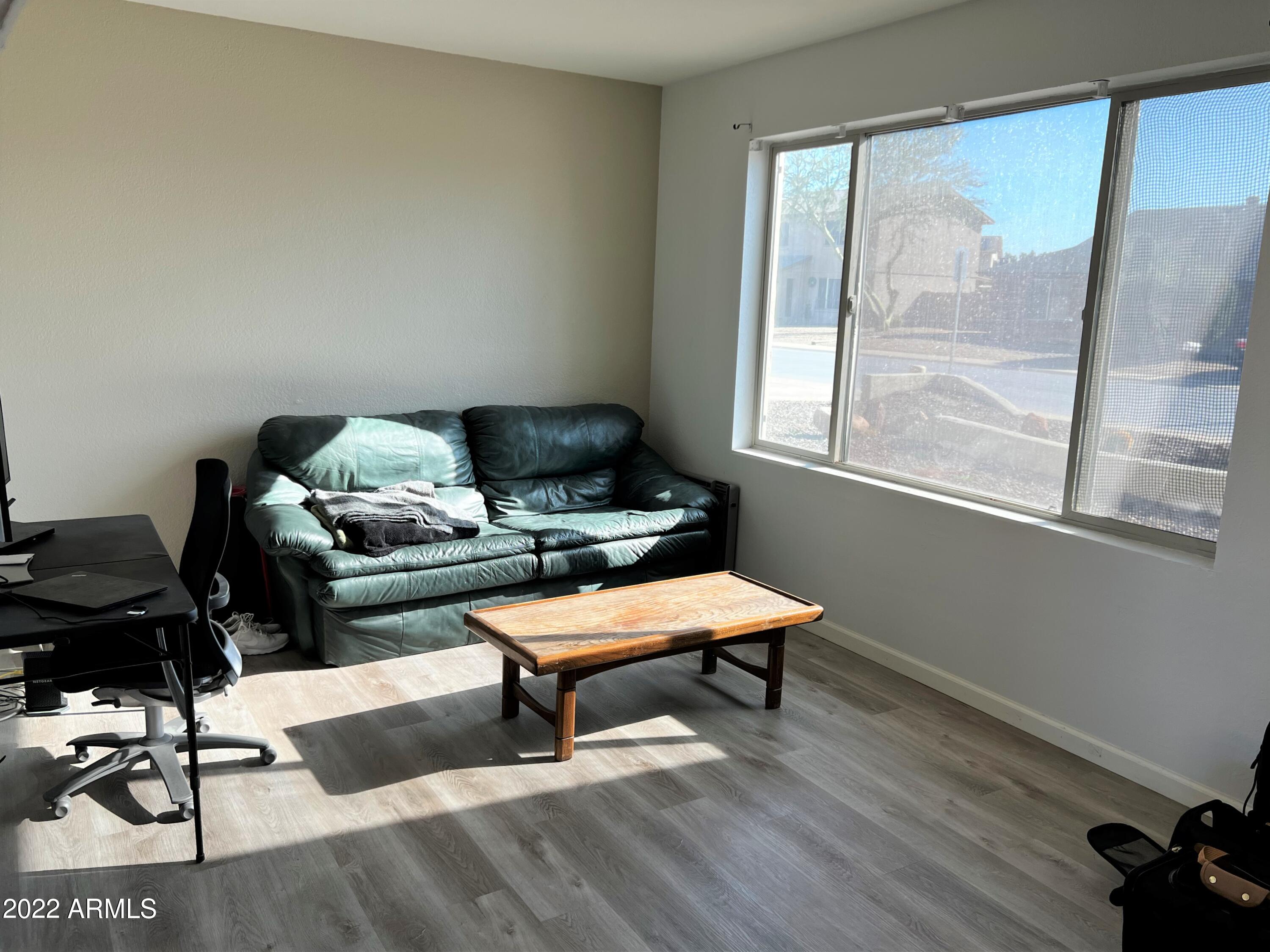 4634 West Calavar Road Glendale, AZ 85306 - Photo 8 of 26 Living Room Could Be Office