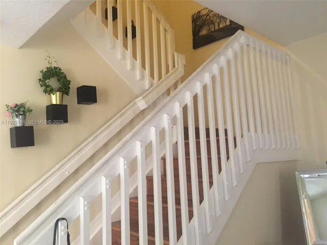 a kitchen with a sink and a microwave