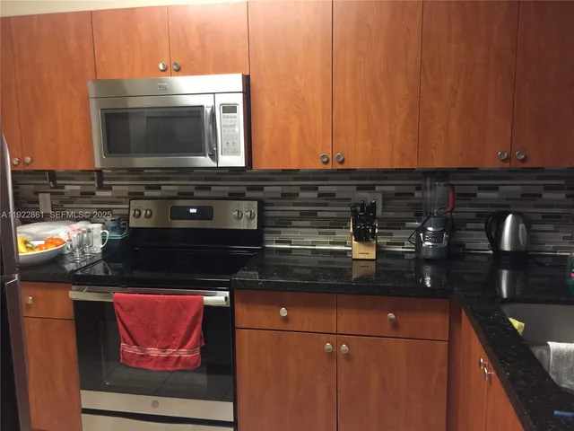 an empty room with wooden floor