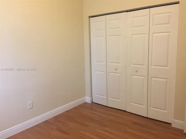 a view of a bathroom from the hallway