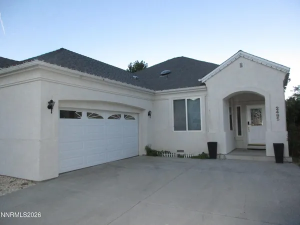 a view of a house with garage