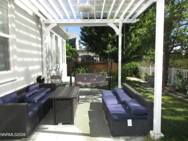 a view of porch with a furniture