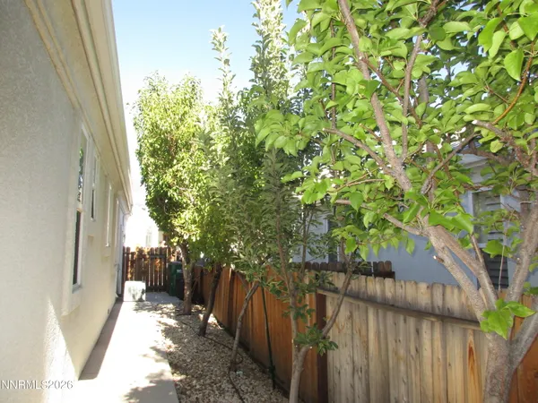 a backyard of a house with lots of green space