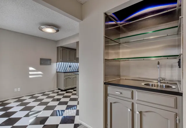 a kitchen with a cabinets and appliances