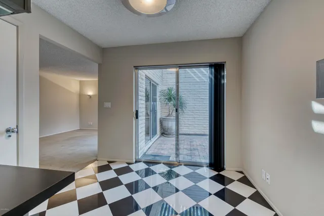 a black and white checkered floor with a black white checkered floor