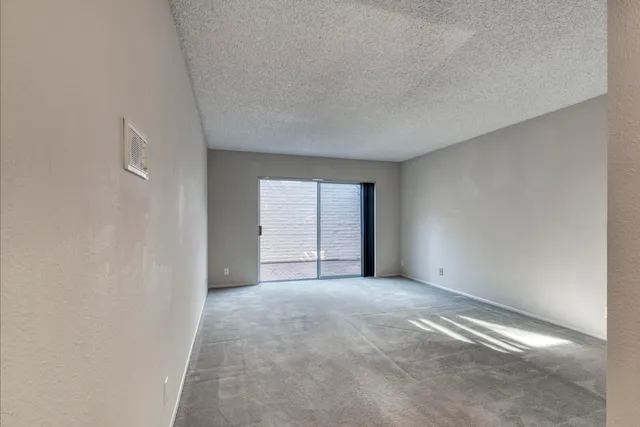 a view of an empty room with window