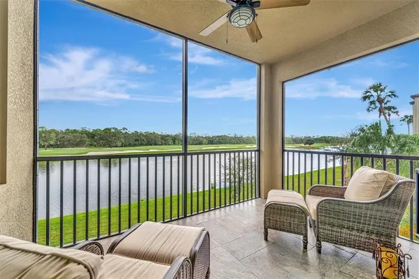 a view of a chairs and tables in patio