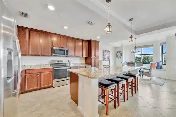 a dining room with furniture window and wooden floor