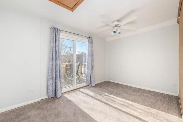 an empty room with fan