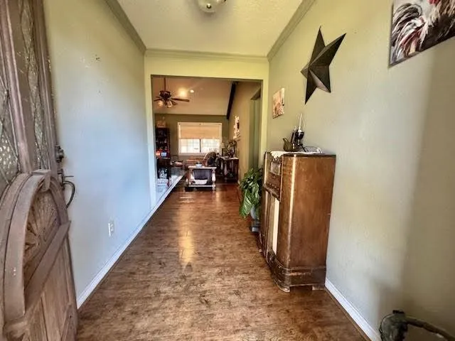 a view of living room with furniture and a window