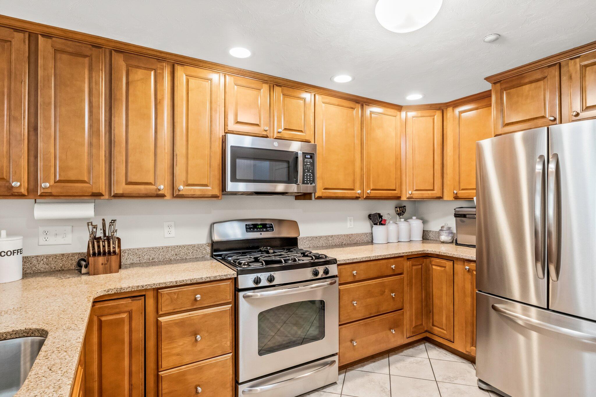 22 North Ridge Road Mashpee, MA 02649 - Photo 5 of 33 a kitchen with stainless steel appliances a refrigerator sink and microwave