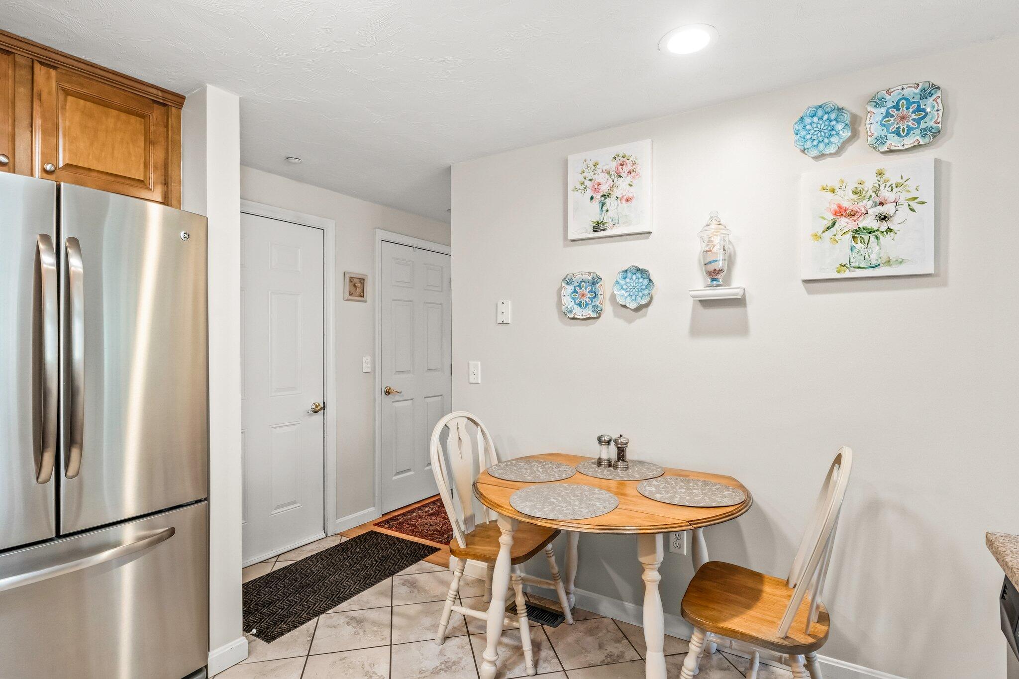 22 North Ridge Road Mashpee, MA 02649 - Photo 6 of 33 a view of a dining room with furniture window and wooden floor