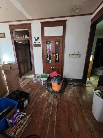 a view of walk in closet with clothes