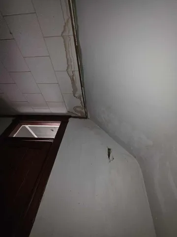 a bathroom with a toilet and a sink